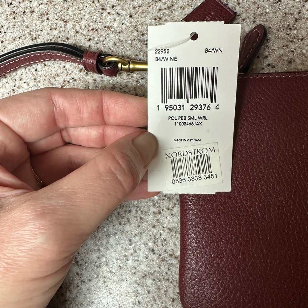 Coach wristlet, burgundy, new with tags